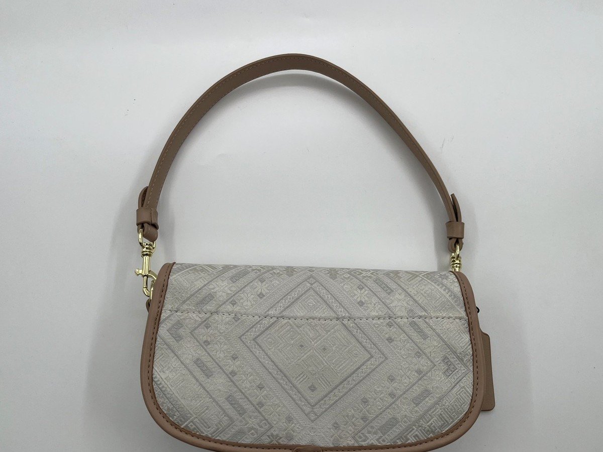 Brocade handbags with metal clasps