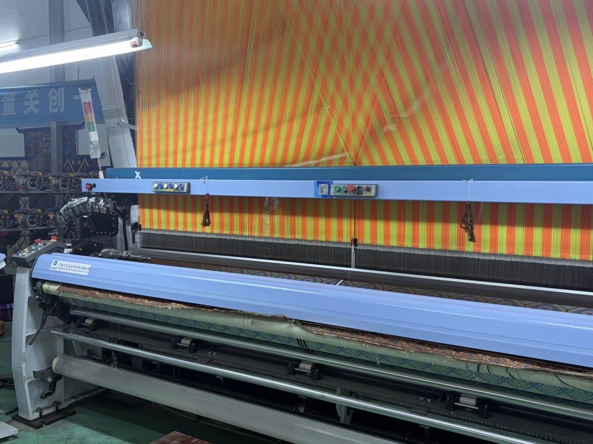 Jacquard loom weaving brocade on the factory floor